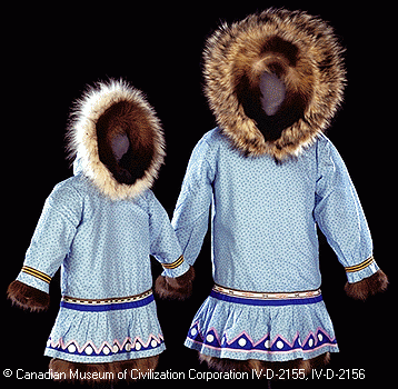 Woman's and girl's Mother Hubbards made by Margarite Tangik Egotak, Holman, Northwest Territories, 1987