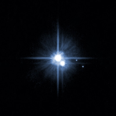 Pluto and moons, HSTimage, 2006